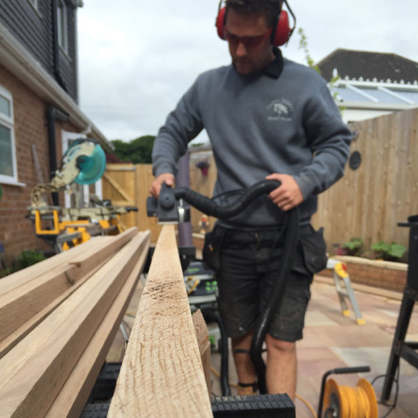 Joiner working at kitchen in Chester