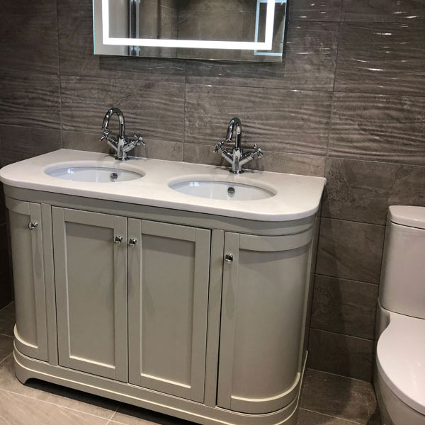 Bathroom sink and cupboard in Wrexham